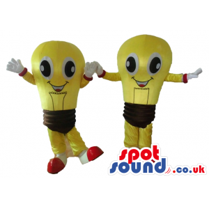 Couple of smiling yellow and brown lightbulbs with big eyes and