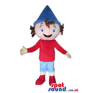 Boy with brown hair wearing a red t-shirt and red boots, blue