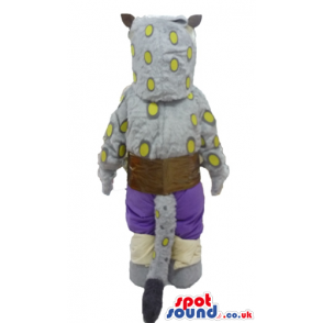 Grey hyena with yellow spots wearing violet shorts and a brown