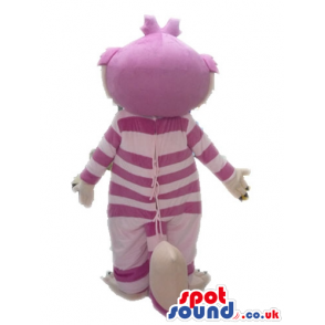 Striped pink cat with big orange eyes and sharp white teeth -