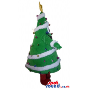 Christmas tree decorated in white with colorful balls and