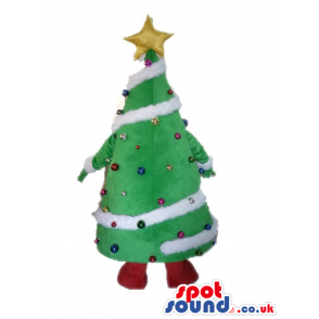 Christmas tree decorated in white with colorful balls and