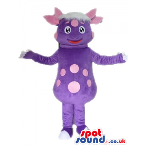Violet monster with white hair and pink dots on the face and