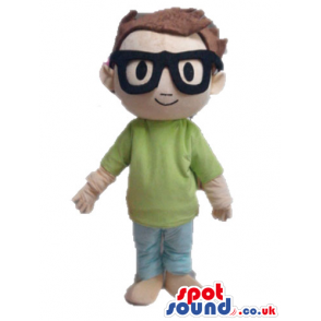 Boy with brown hair wearing glasses, a green sweater