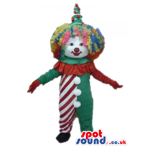 Clown with a red nose and multi color curly hair wearing a