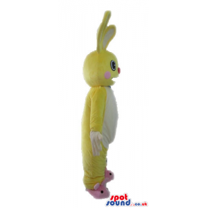 Yellow rabbit with long ears, a small round red nose, big white