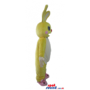 Yellow rabbit with long ears, a small round red nose, big white