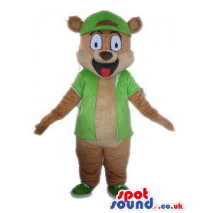 Smiling brown bear with big round eyes wearing a green cap and