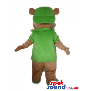 Smiling brown bear with big round eyes wearing a green cap and