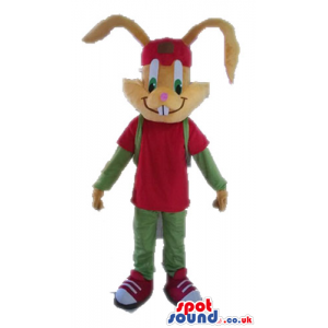 Brown rabbit with long ears and big green eyes wearing a red