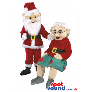 Grandmother And Santa Claus Mascots With Green And Red Garments