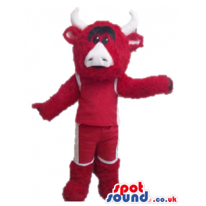 Red bull with white horns and a white nose wearing red boots -