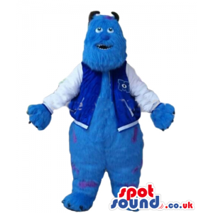 Blue furry monster with brown horns and claws and violet dots -