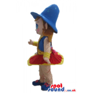 Girl with brown hair wearing a blue hat, blue shoes, a red mini