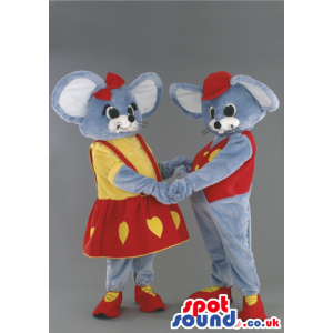 A Couple Of Mice Mascots Wearing Yellow And Red Garments -