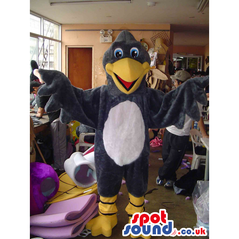 Bird Animal Mascot With Yellow Legs And Beak And White Belly -