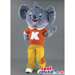 Koala Animal Mascot With Orange T-Shirt And Yellow Pants -