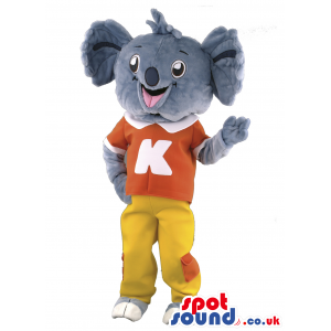 Koala Animal Mascot With Orange T-Shirt And Yellow Pants -