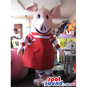 Pink Piglet Animal Mascot With Red Dress And Striped T-Shirt -