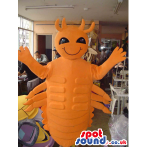 Orange Shrimp Seafood Mascot With Black Eyes And Many Legs -
