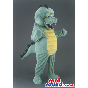 Green Alligator Animal Mascot With Yellow Belly And Teeth -