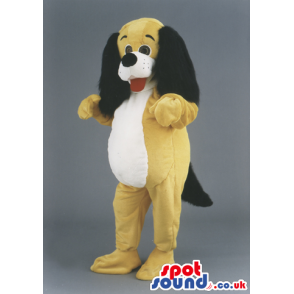 Yellow Dog Animal Mascot With Long Black Ears And Red Tongue -