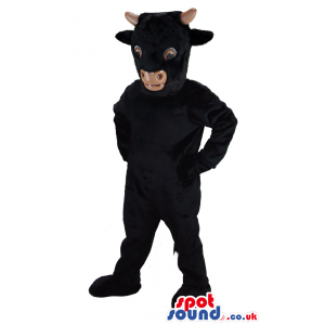 Plain Black Bull Animal Mascot With Horns And Brown Eyes -