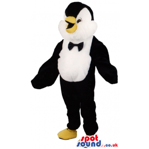 Penguin Polar Animal Mascot With A Black Bow Tie And Yellow