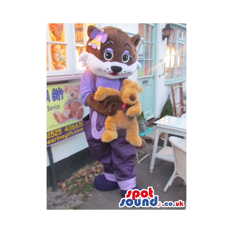 Girl Pussy Cat Animal Mascot With Purple Clothes And A Ribbon -
