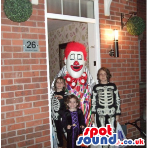 Big White Clown Mascot With Red Hair, Nose And Colorful Clothes