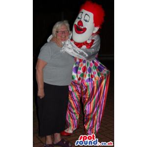 Big White Clown Mascot With Red Hair, Nose And Colorful Clothes
