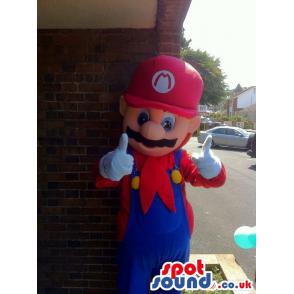 Super Mario with blue jumper and in red shirt & in red hard cap