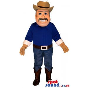 Cowboy Human Mascot Wearing Blue Jeans And A Hat With A
