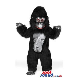 Giant black chimpansee mascot smiling with a cute look - Custom