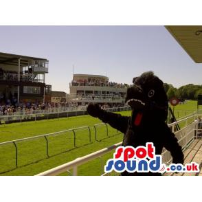 Giant black chimpansee mascot smiling with a cute look - Custom