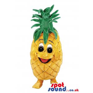 Pineapple mascot with green hair and yellow body and socks -