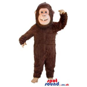 Monkey mascot in brown colour with bare foot looking at you -