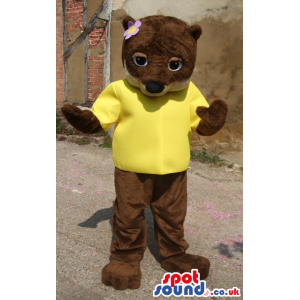 Brown And White Plush Cat Animal Mascot Wearing A Purple Flower