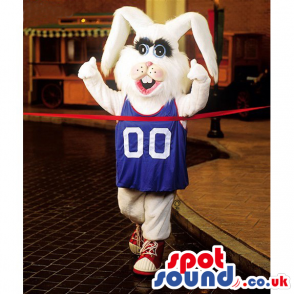 White Rabbit Mascot Wearing A Blue T-Shirt And Sports Sneakers