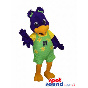 Blue Bird Mascot Wearing Green Overalls With Flowers And Logo -