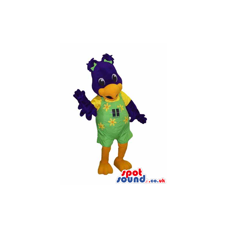 Blue Bird Mascot Wearing Green Overalls With Flowers And Logo -