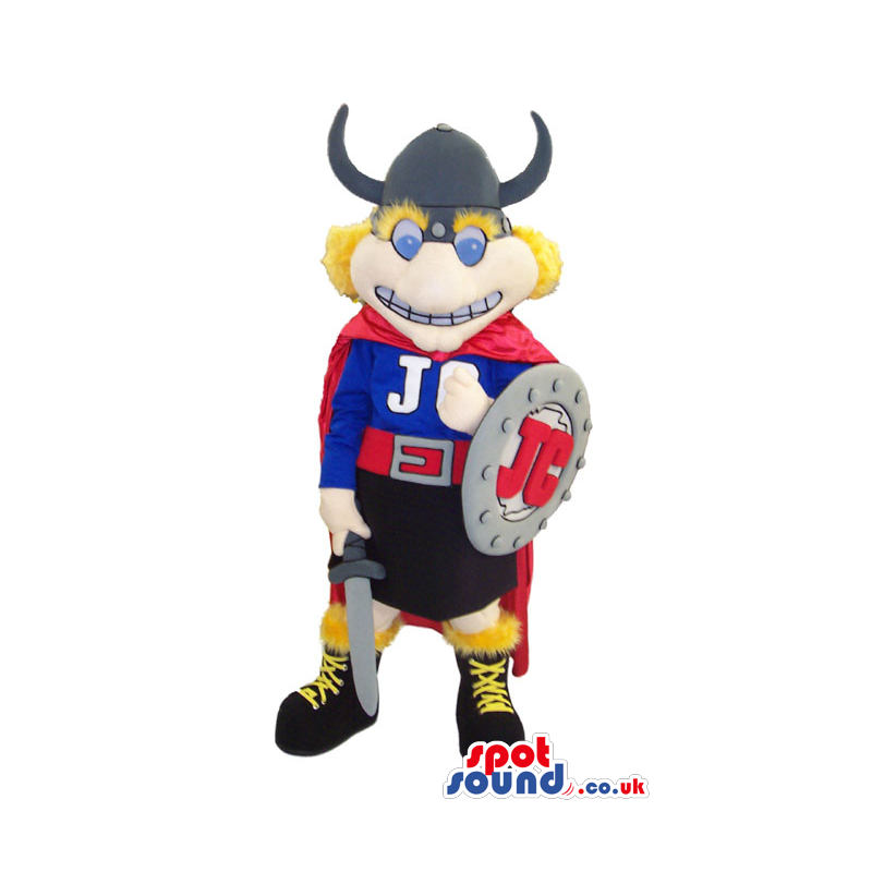 Viking Mascot Wearing A Cape, Shield And Helmet With Horns -