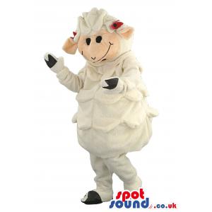 Sheep mascot in white clothes with black shoes and gloves -