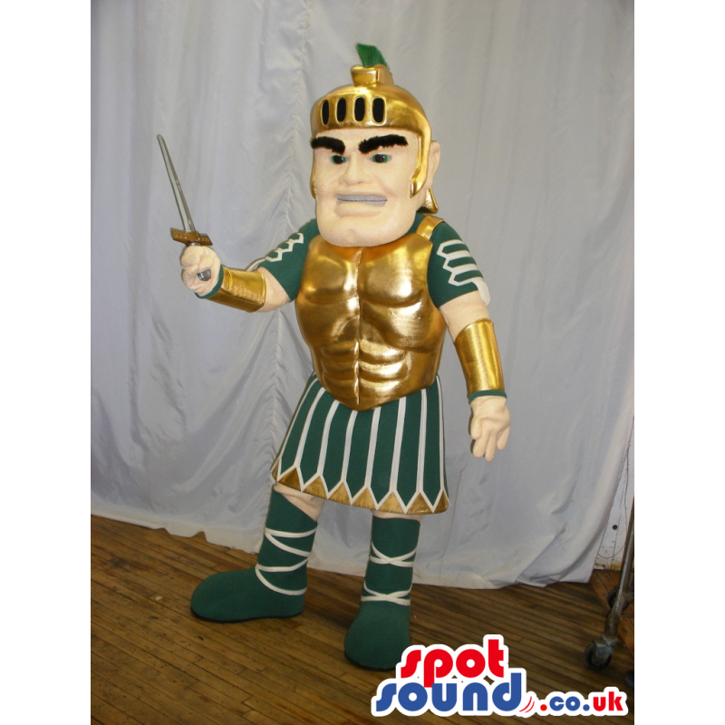 Gladiator Human Mascot Wearing Green And Golden Armor And A