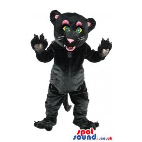 Wild cat mascot in black putting his hands in air & greeting us