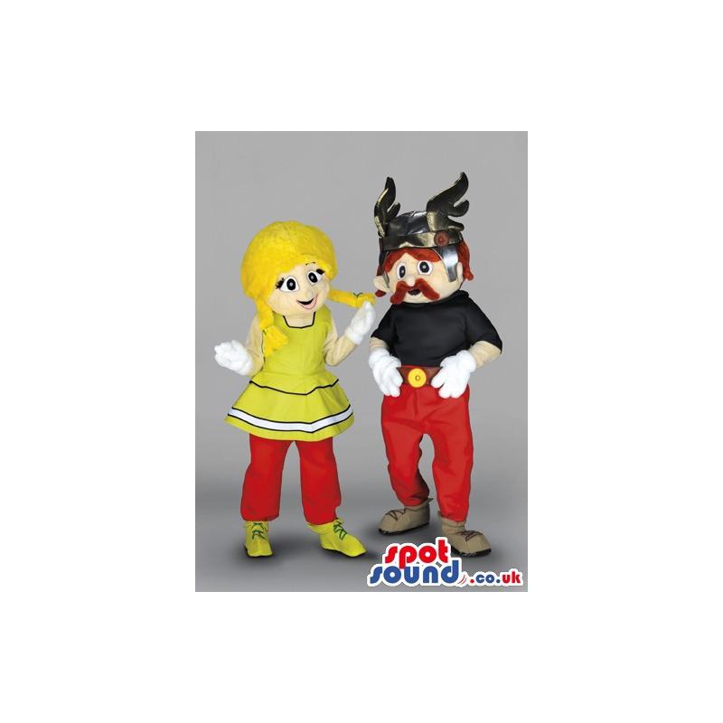 Man mascot with horn cap and woman mascot with yellow hair -