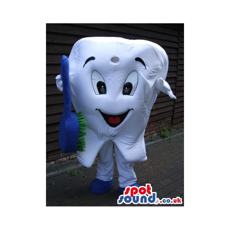 Happy teeth mascot with brush in his hands and in white -