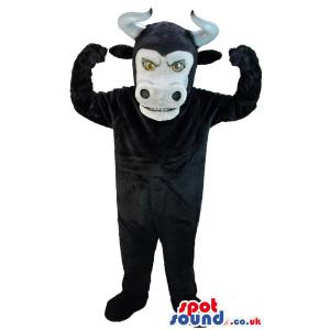 Black bull mascot with horn and raising hands with amazed look