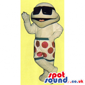 Beige Turtle Mascot Wearing Sunglasses And Shorts With Spots -