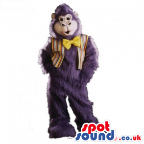 Hairy Purple Monkey Mascot Wearing A Vest And A Bow Tie -